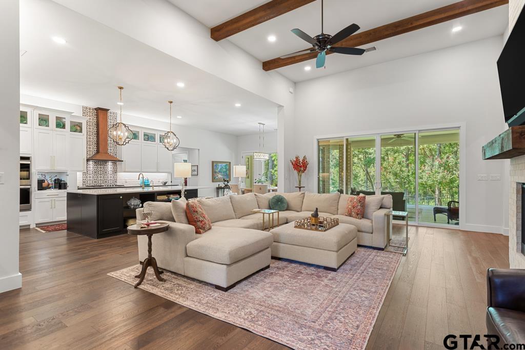 2926 Stewart Way Tyler, TX 75709 - Photo 13 of 33 a living room with furniture and a large window