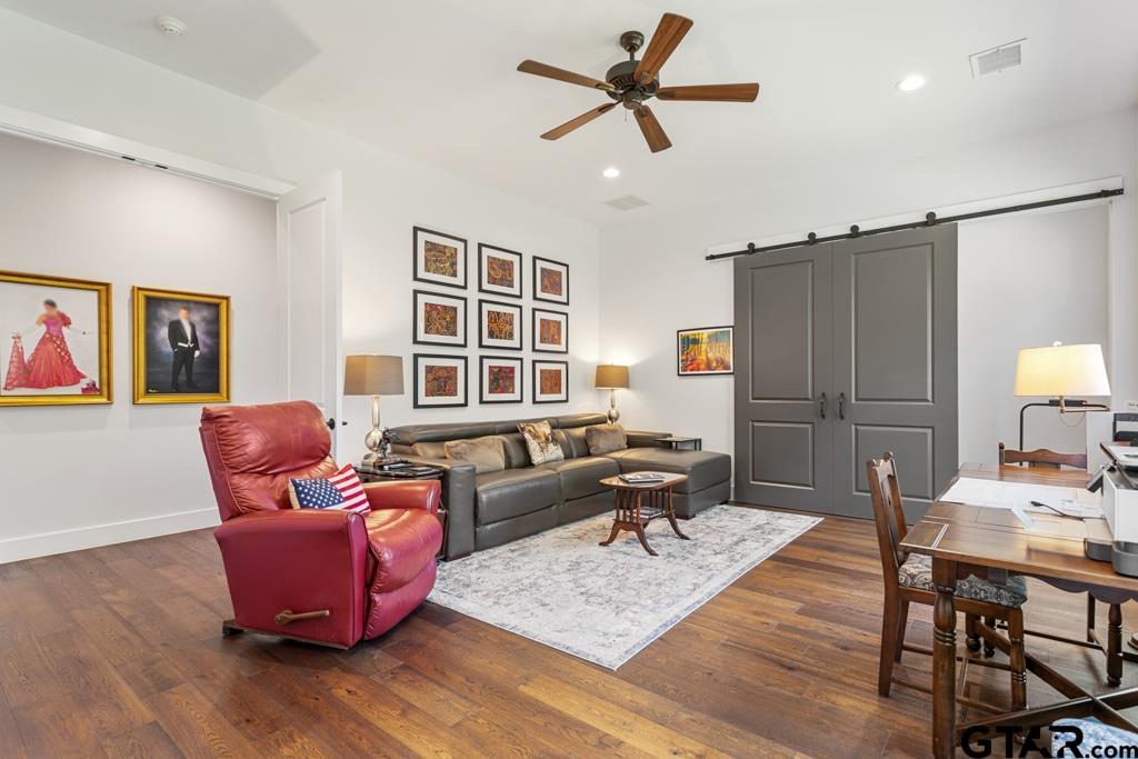 2926 Stewart Way Tyler, TX 75709 - Photo 14 of 33 a living room with furniture and a window