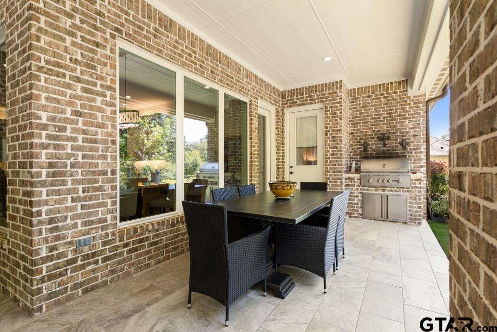 2926 Stewart Way Tyler, TX 75709 - Photo 27 of 33 a dining room with furniture and large windows
