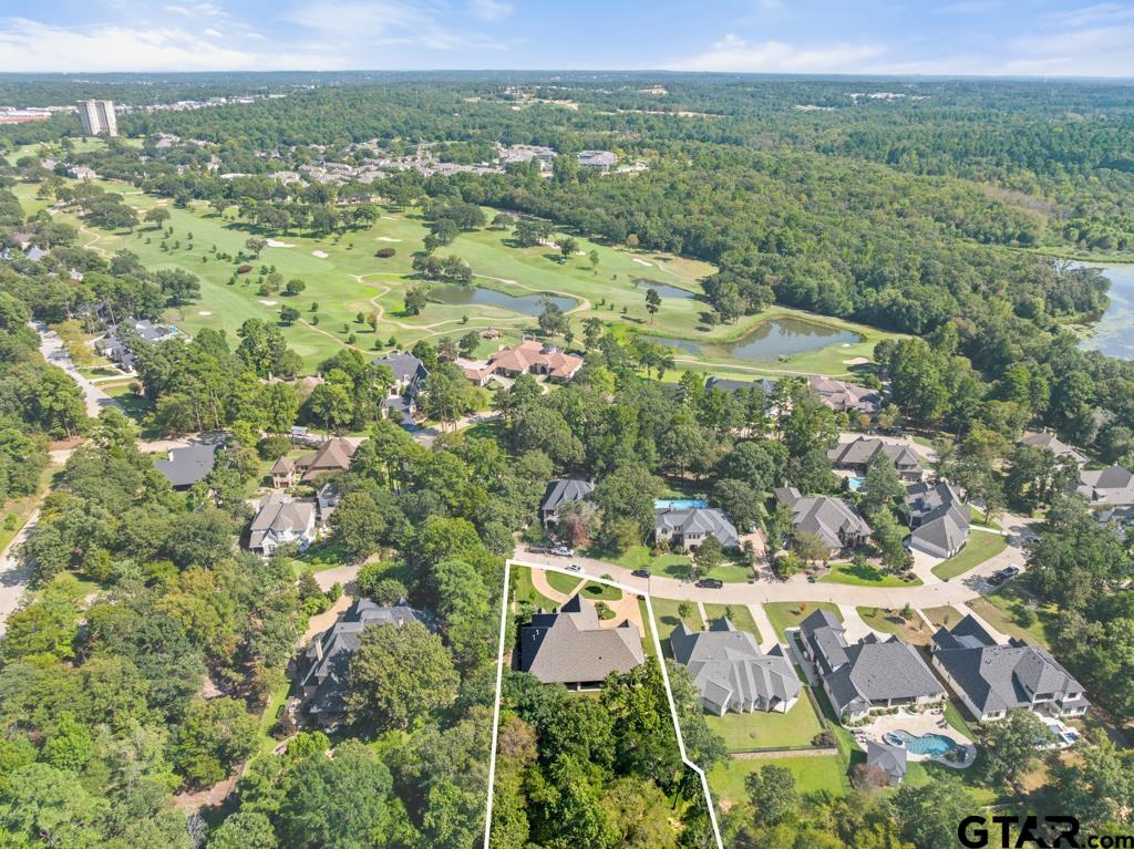 2926 Stewart Way Tyler, TX 75709 - Photo 31 of 33 an aerial view of residential houses with outdoor space and trees