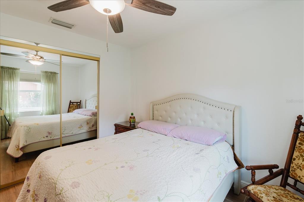 8112 Golden Bear Loop Port Richey, FL 34668 - Photo 49 of 88 a bedroom with a bed and window