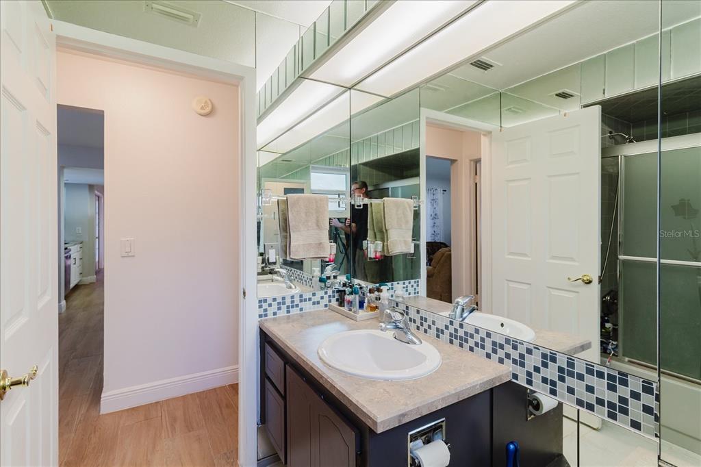 8112 Golden Bear Loop Port Richey, FL 34668 - Photo 51 of 88 a bathroom with a sink and a mirror
