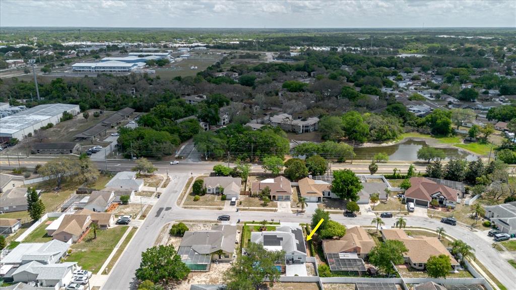 8112 Golden Bear Loop Port Richey, FL 34668 - Photo 68 of 88 an aerial view of residential houses with outdoor space