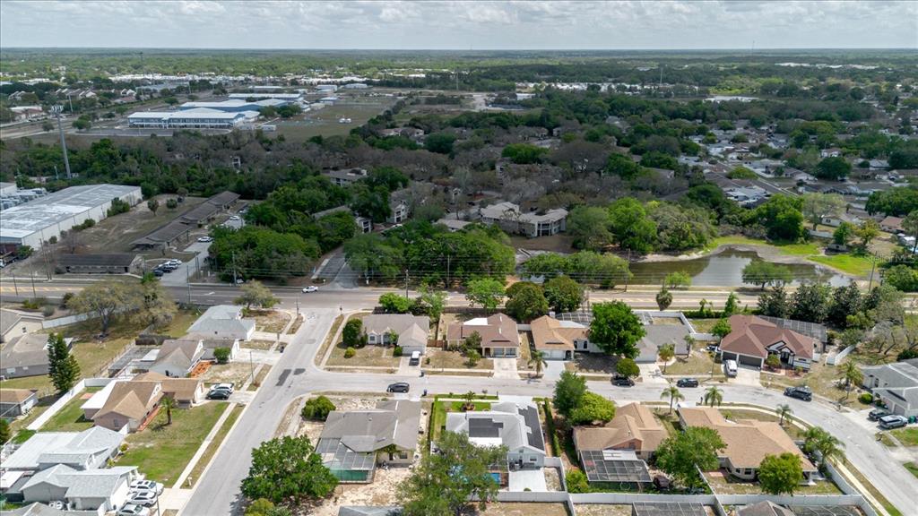 8112 Golden Bear Loop Port Richey, FL 34668 - Photo 80 of 88 an aerial view of residential houses with outdoor space