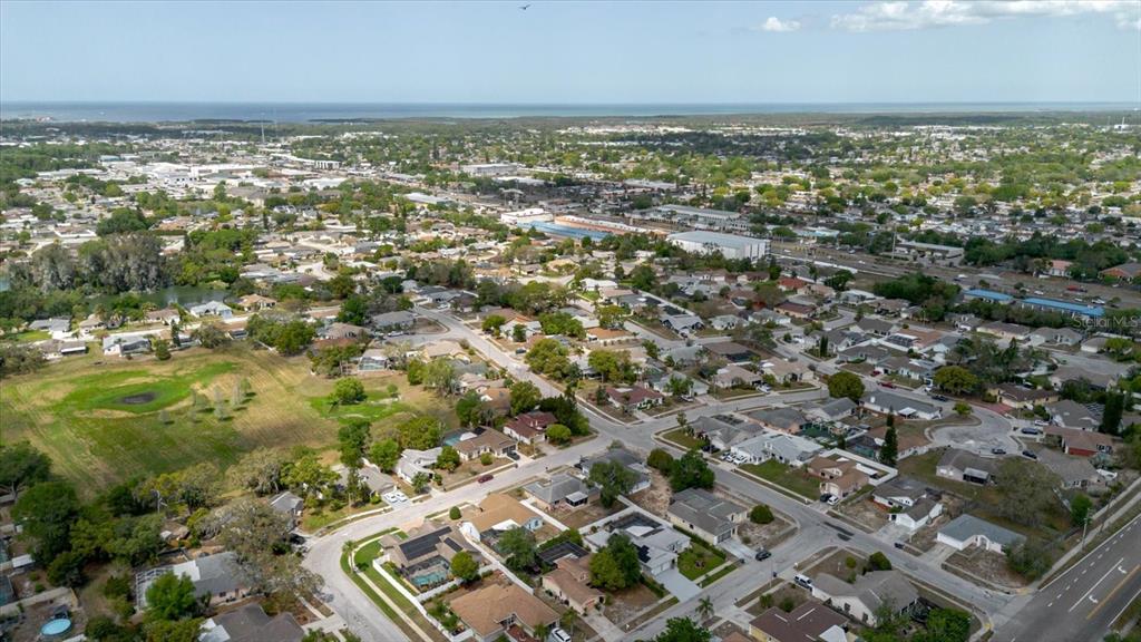 8112 Golden Bear Loop Port Richey, FL 34668 - Photo 83 of 88 an aerial view of residential building with parking space