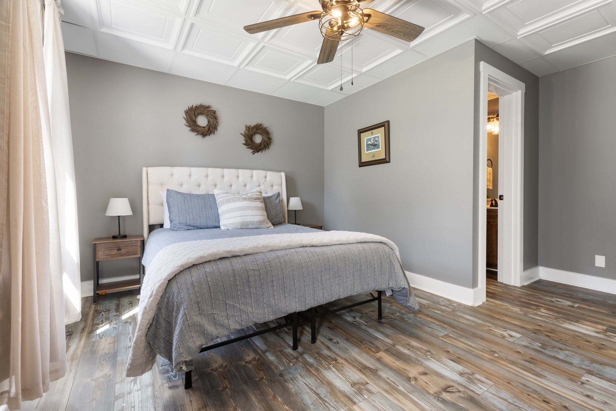 2890 Ellis Lane Palmyra, TN 37142 - Photo 18 of 19 a bedroom with a large bed and a chandelier