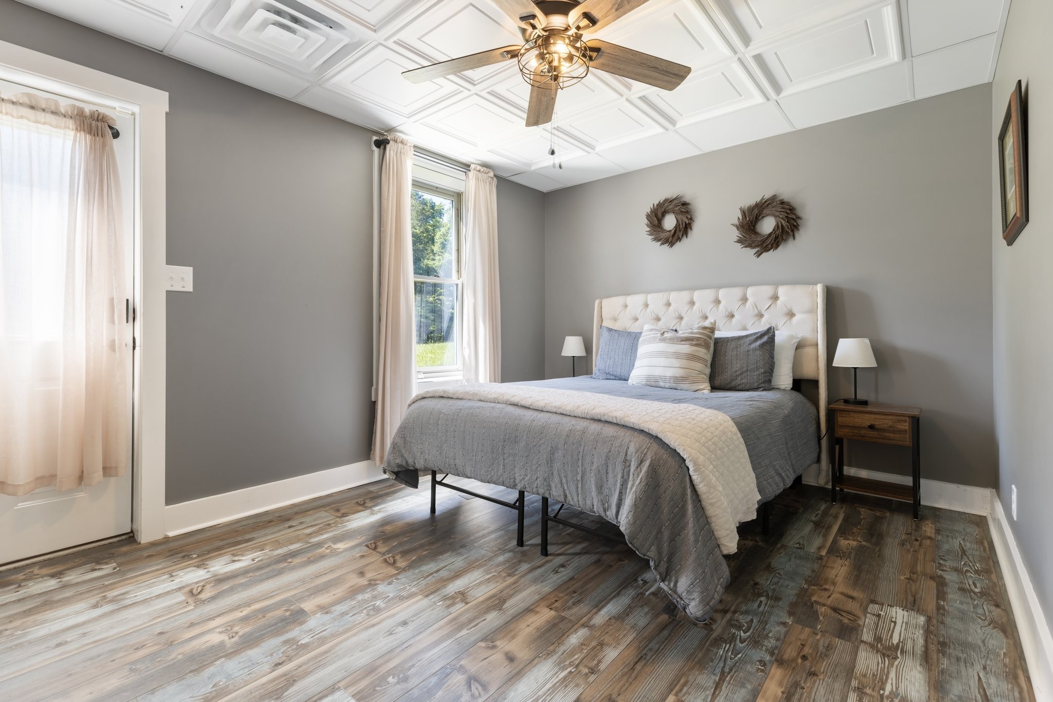 2890 Ellis Lane Palmyra, TN 37142 - Photo 19 of 19 a bedroom with a bed and a chandelier