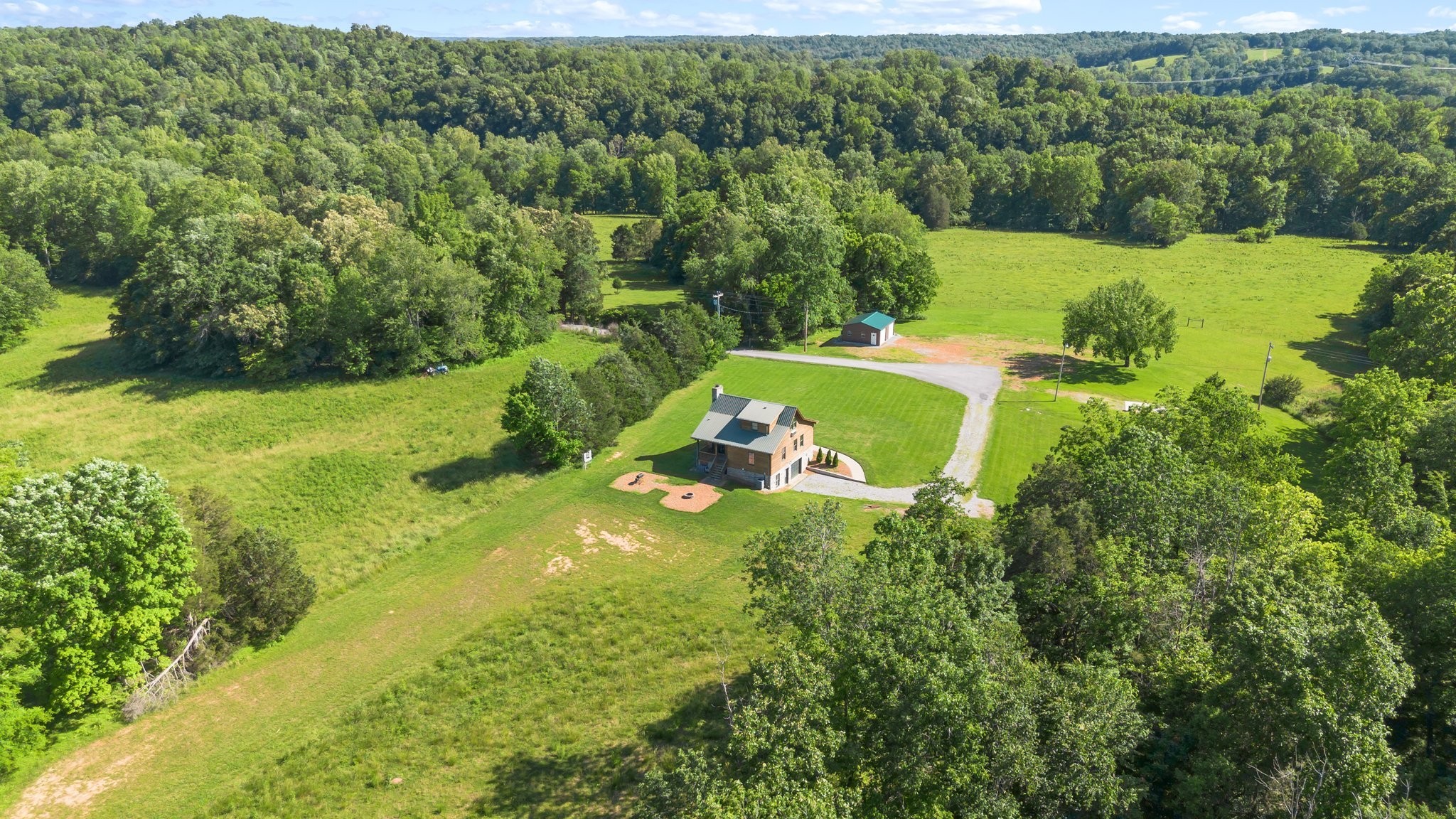 2890 Ellis Lane Palmyra, TN 37142 - Photo 2 of 19 a view of a yard with large trees