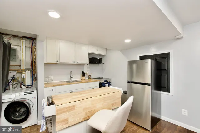a view of kitchen with breakfast area