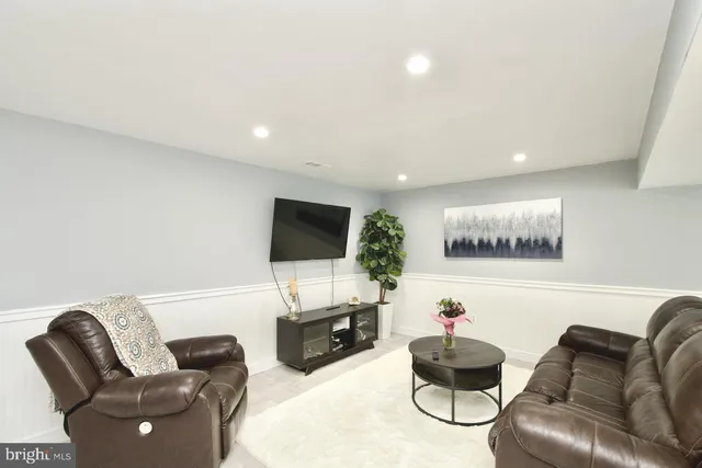 a view of a workspace with furniture and a chair
