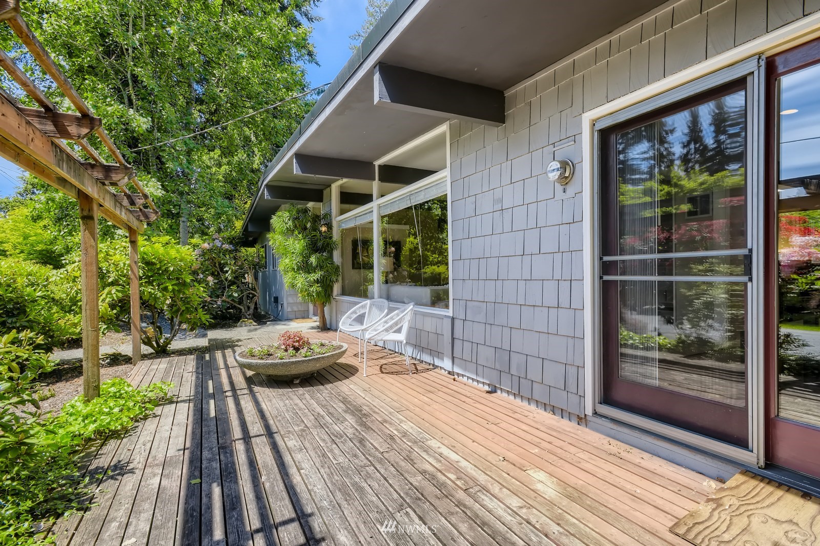 2207 242nd Street Southwest Bothell, WA 98021 - Photo 2 of 28 a outdoor space with a bed