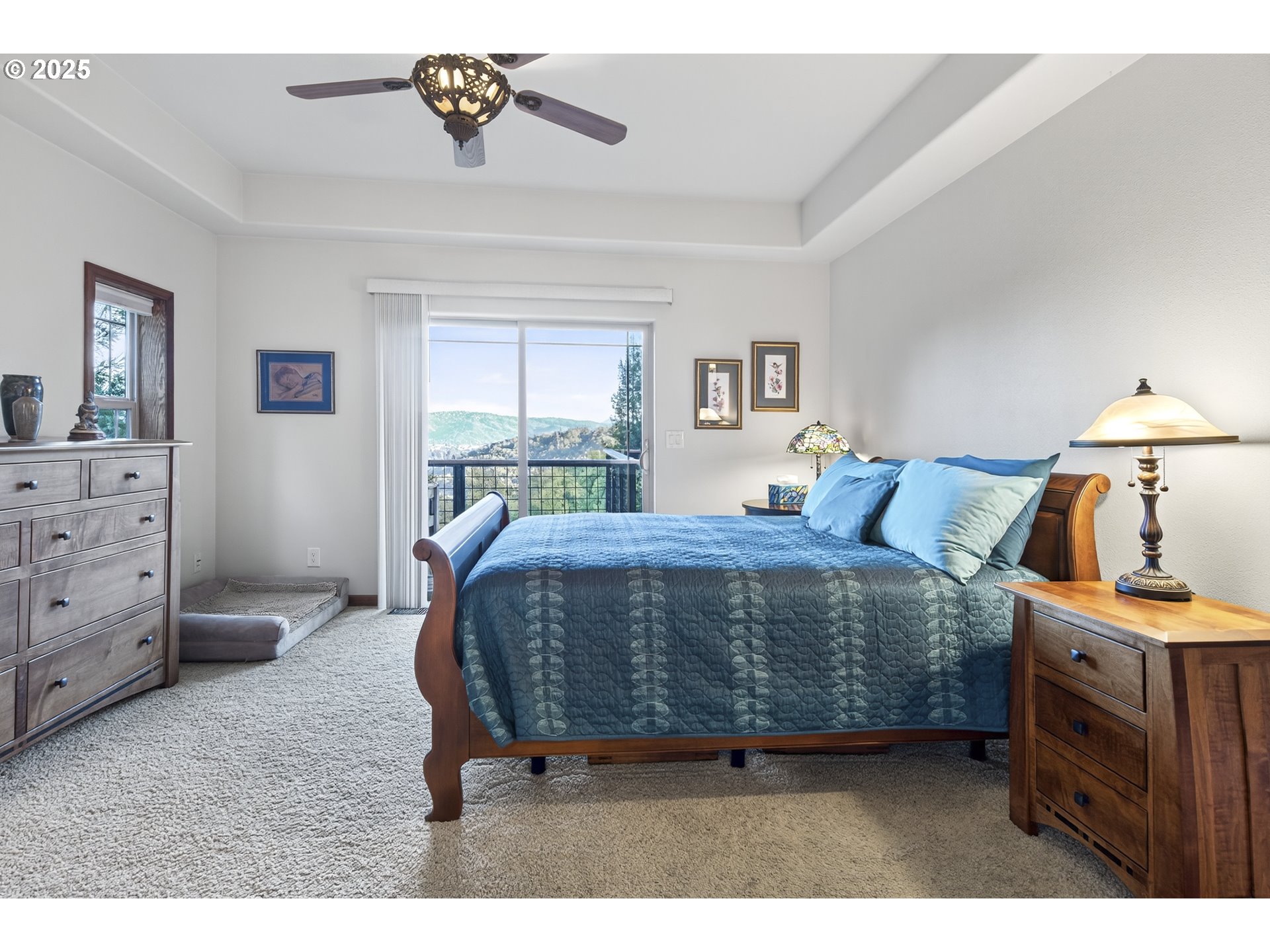 1645 Brozio Road Roseburg, OR 97471 - Photo 15 of 48 a bedroom with a bed and a dresser