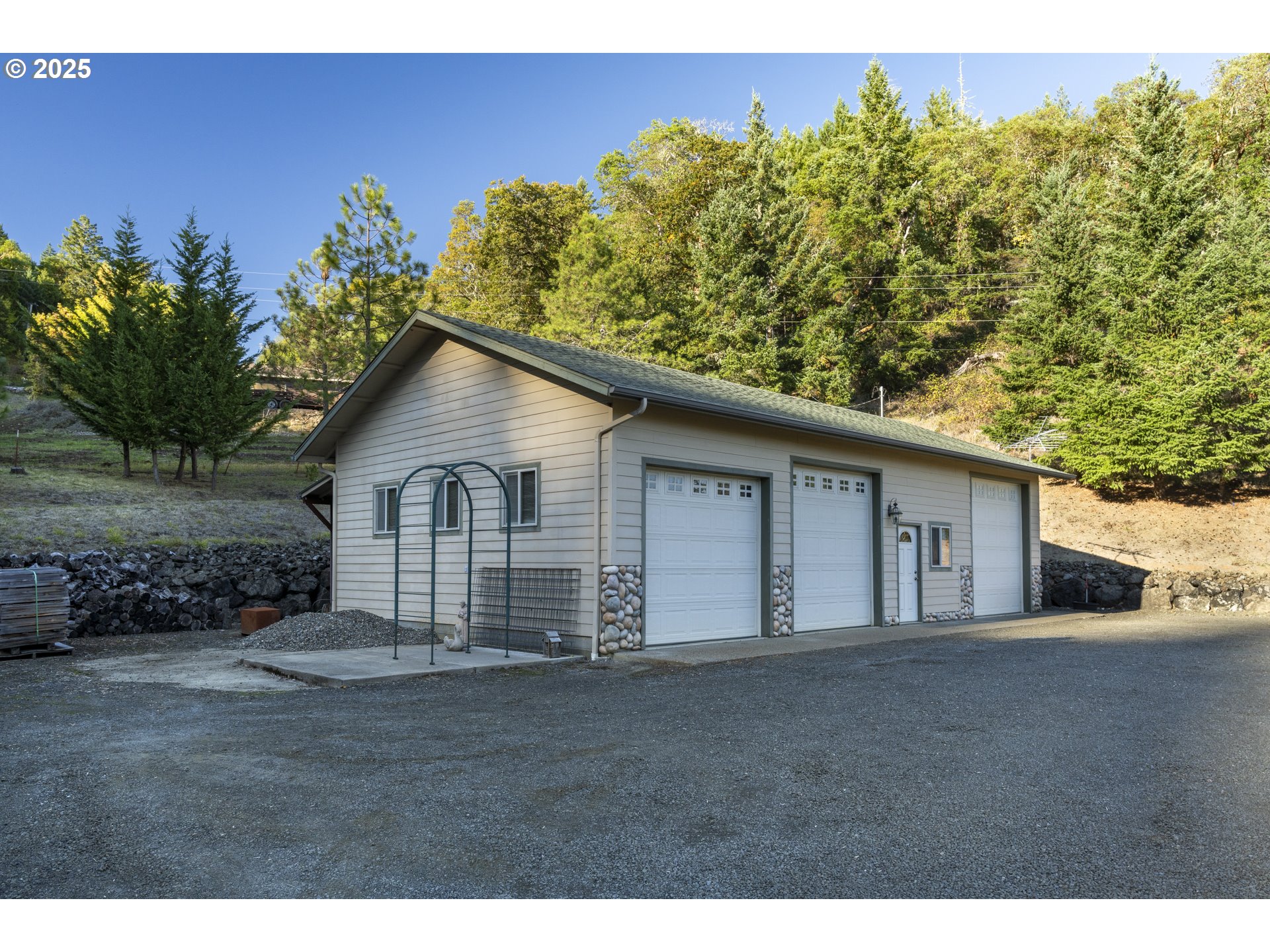 1645 Brozio Road Roseburg, OR 97471 - Photo 26 of 48 a view of a house with a yard