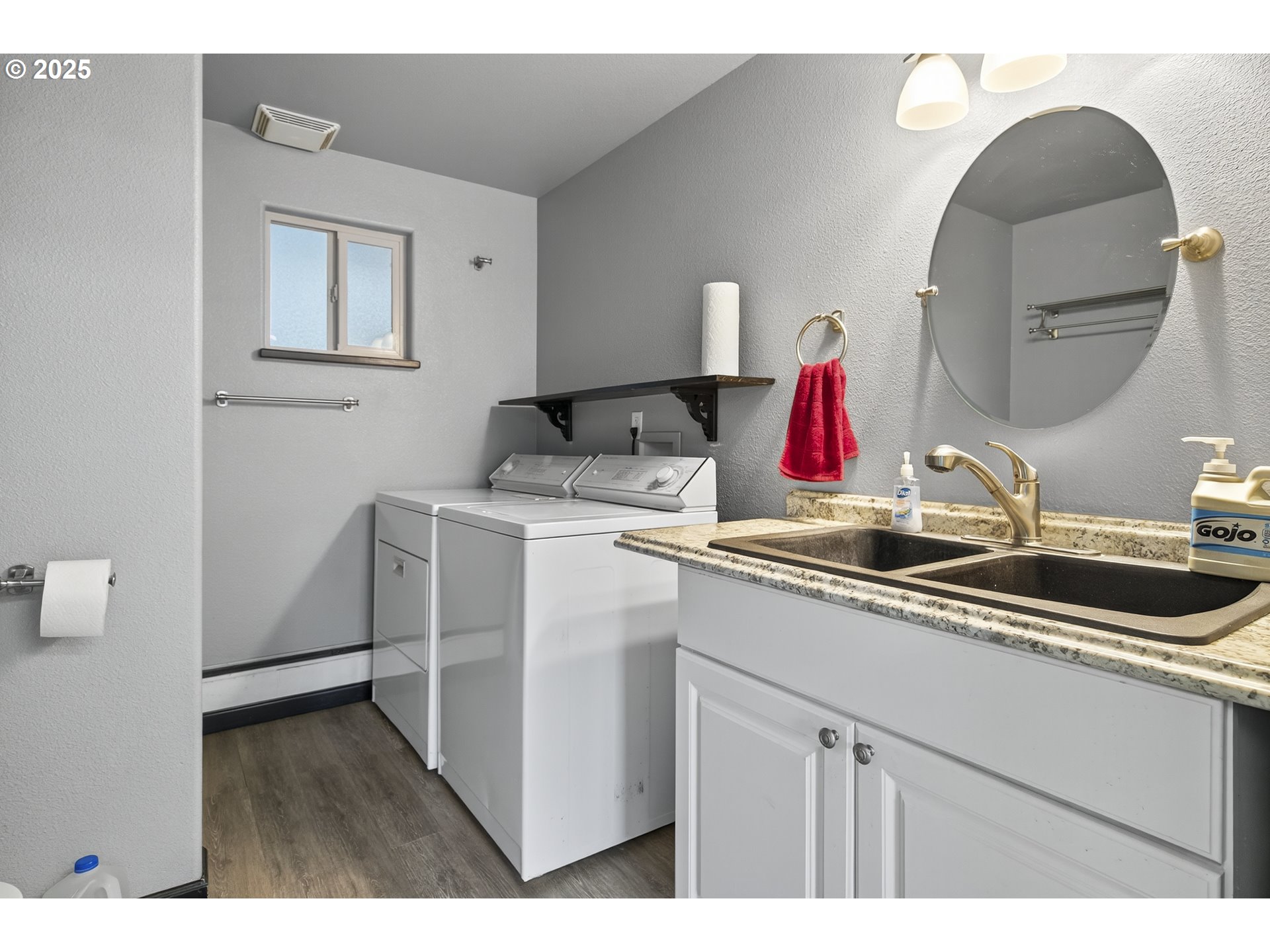 1645 Brozio Road Roseburg, OR 97471 - Photo 29 of 48 a kitchen with a sink and a stove with wooden floor
