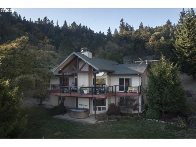 a view of house with outdoor space and backyard