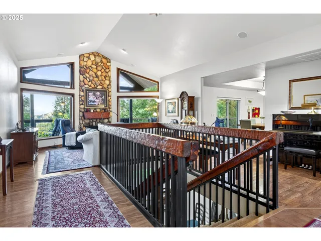 a view of a porch with wooden floor and windows