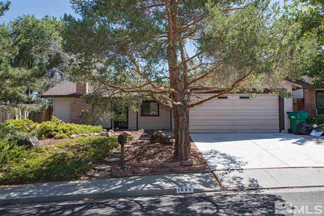 1850 Prior Reno, NV 89503 - Photo 1 of 17 a backyard of a house with table and chairs