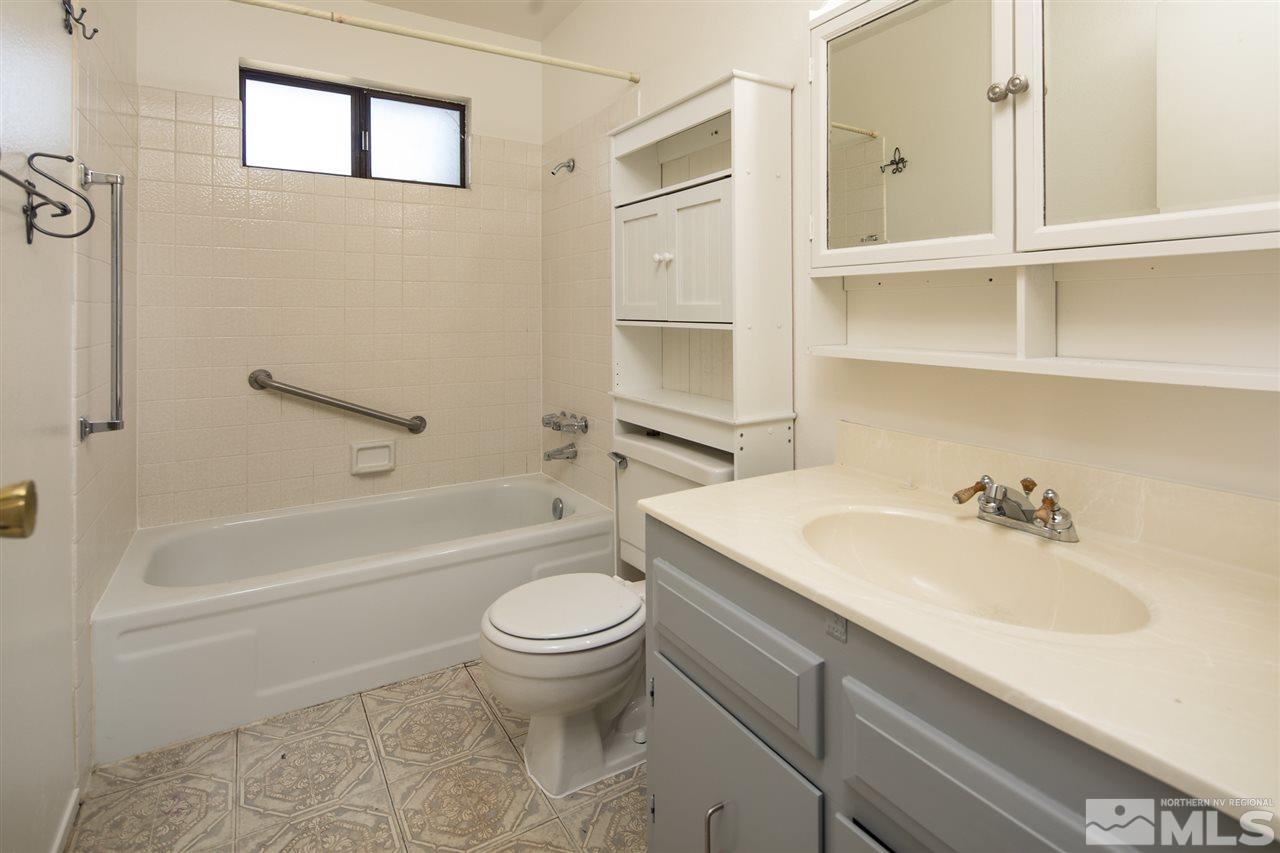 1850 Prior Reno, NV 89503 - Photo 13 of 17 a bathroom with a sink toilet and shower