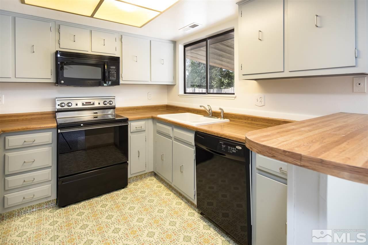 1850 Prior Reno, NV 89503 - Photo 3 of 17 a kitchen with a sink stove and microwave