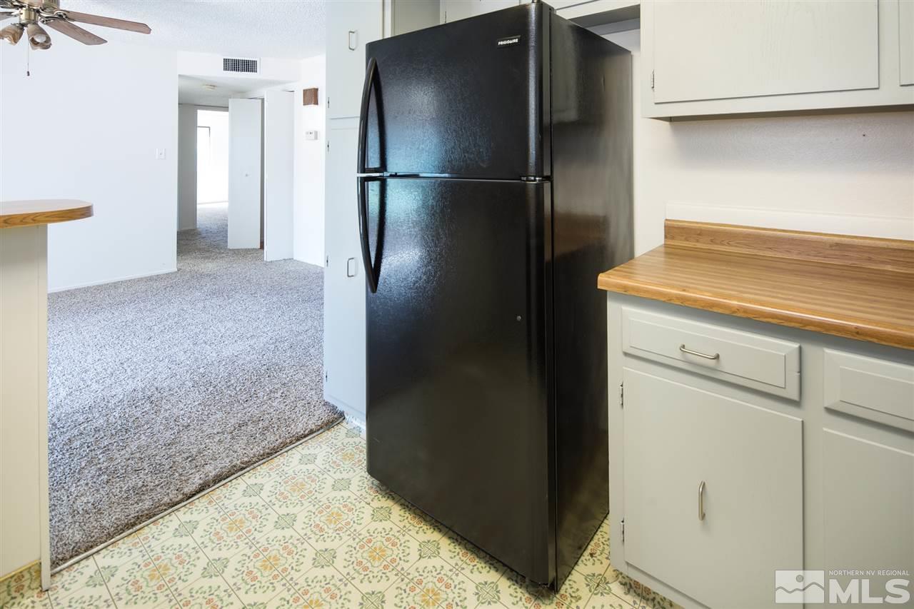 1850 Prior Reno, NV 89503 - Photo 4 of 17 a kitchen with a refrigerator and cabinets