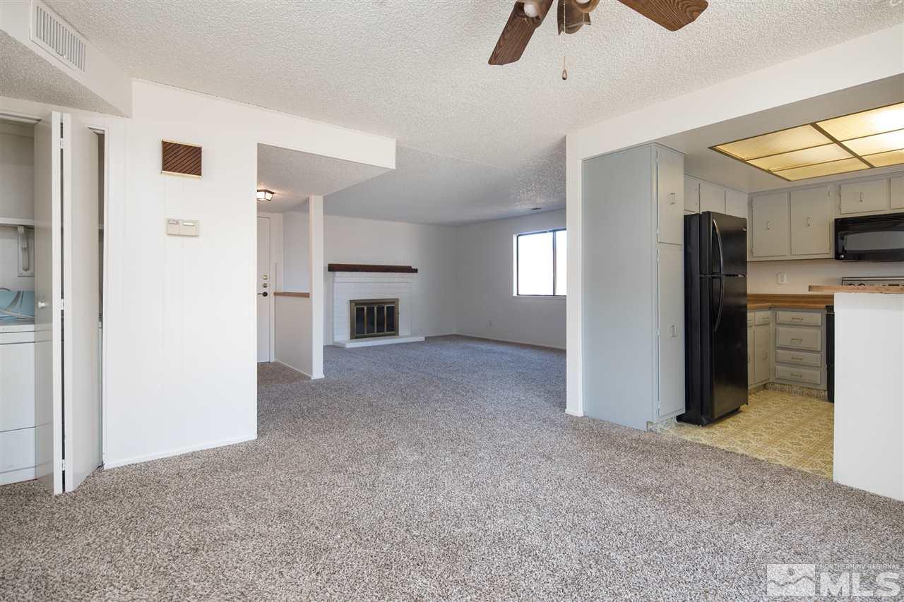 1850 Prior Reno, NV 89503 - Photo 5 of 17 a view of an empty room with window and kitchen view