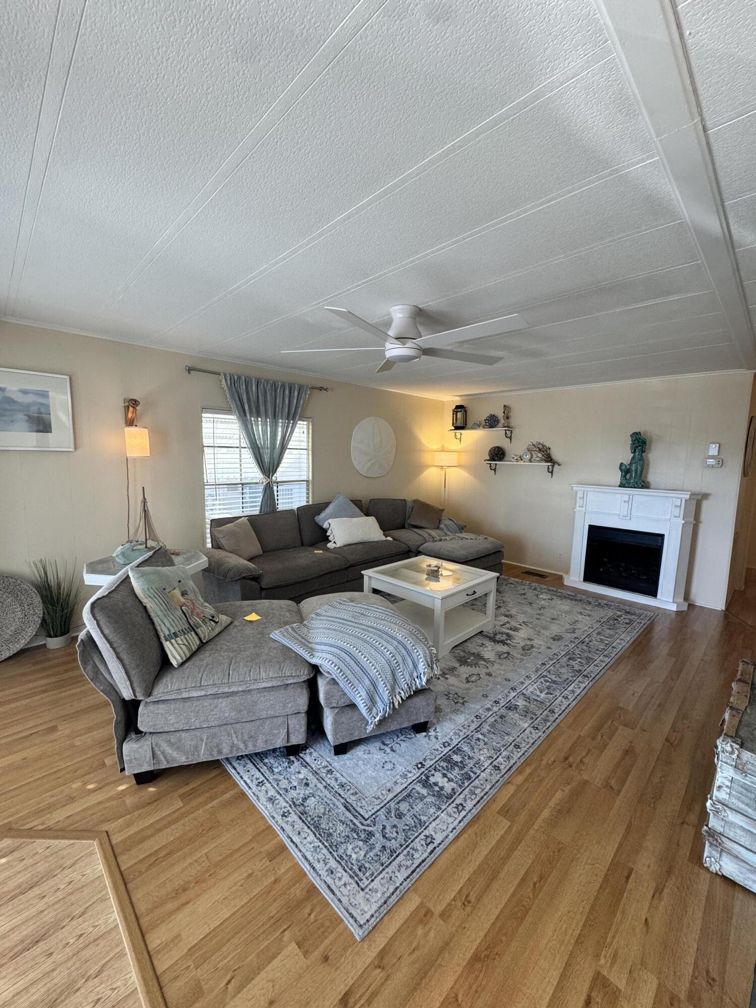 17 Verde Vista Fort Pierce, FL 34951 - Photo 16 of 35 a living room with furniture and a rug
