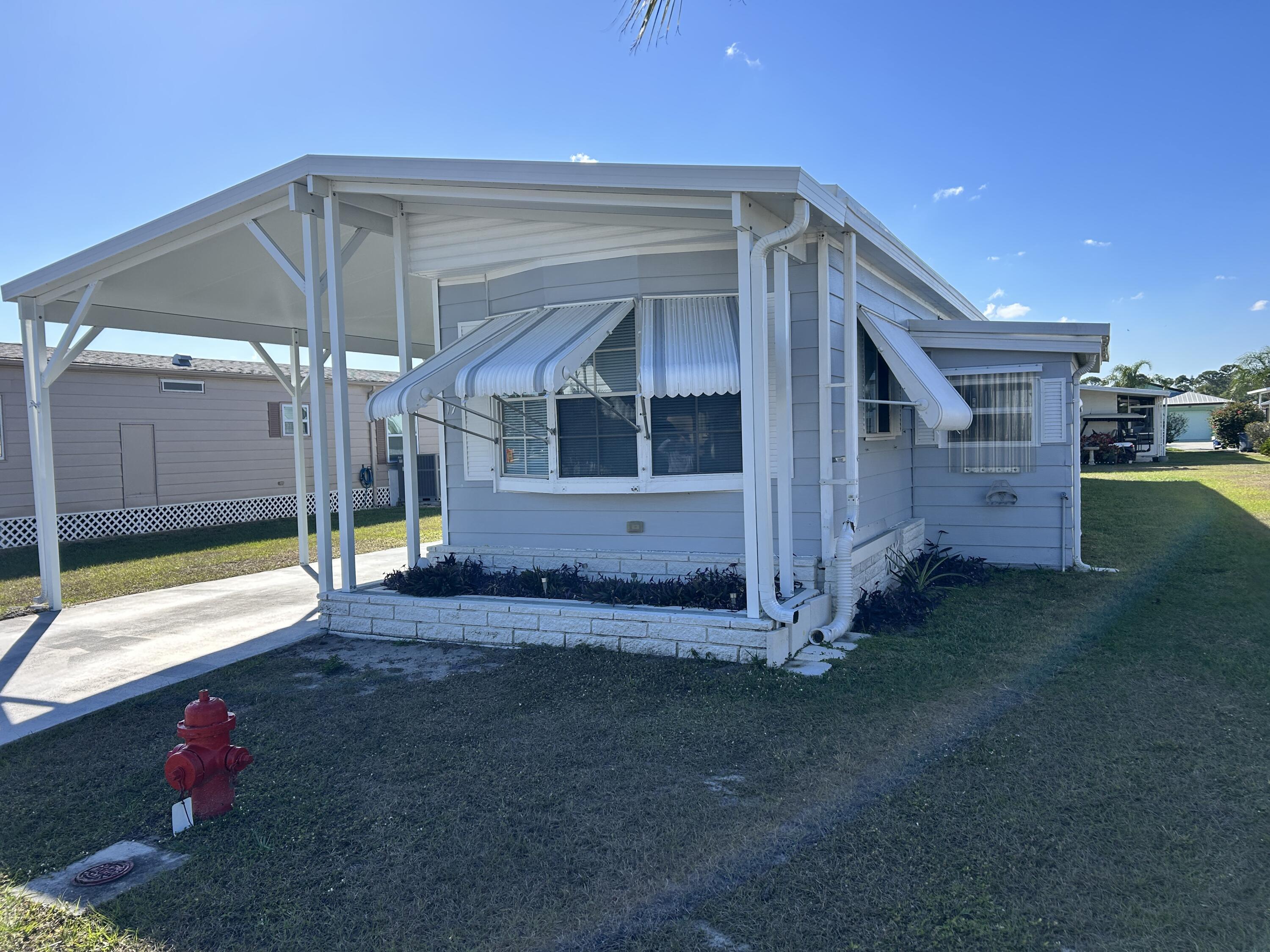 17 Verde Vista Fort Pierce, FL 34951 - Photo 2 of 35 a view of back yard of the house