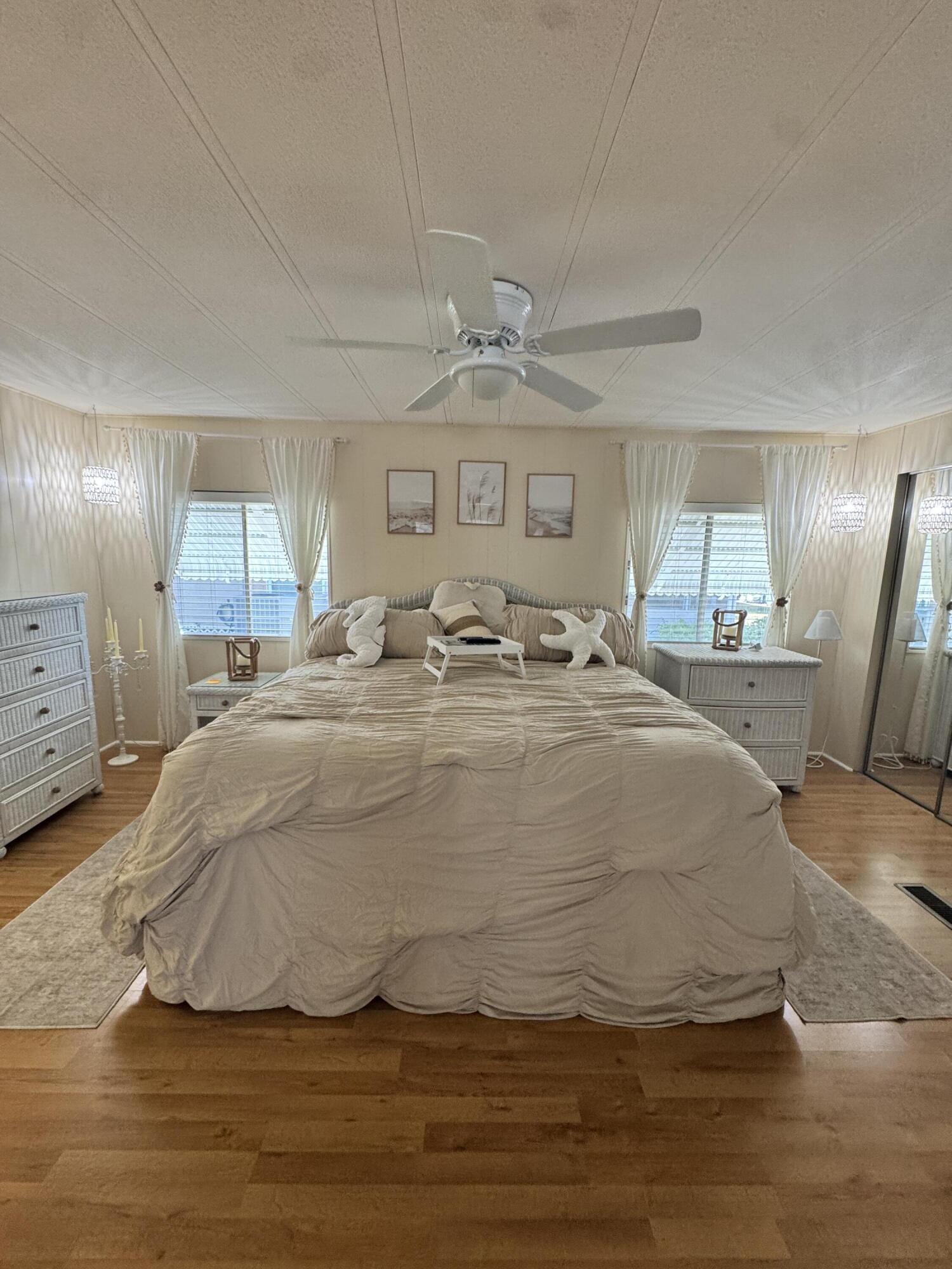 17 Verde Vista Fort Pierce, FL 34951 - Photo 23 of 35 a large white bed in a room