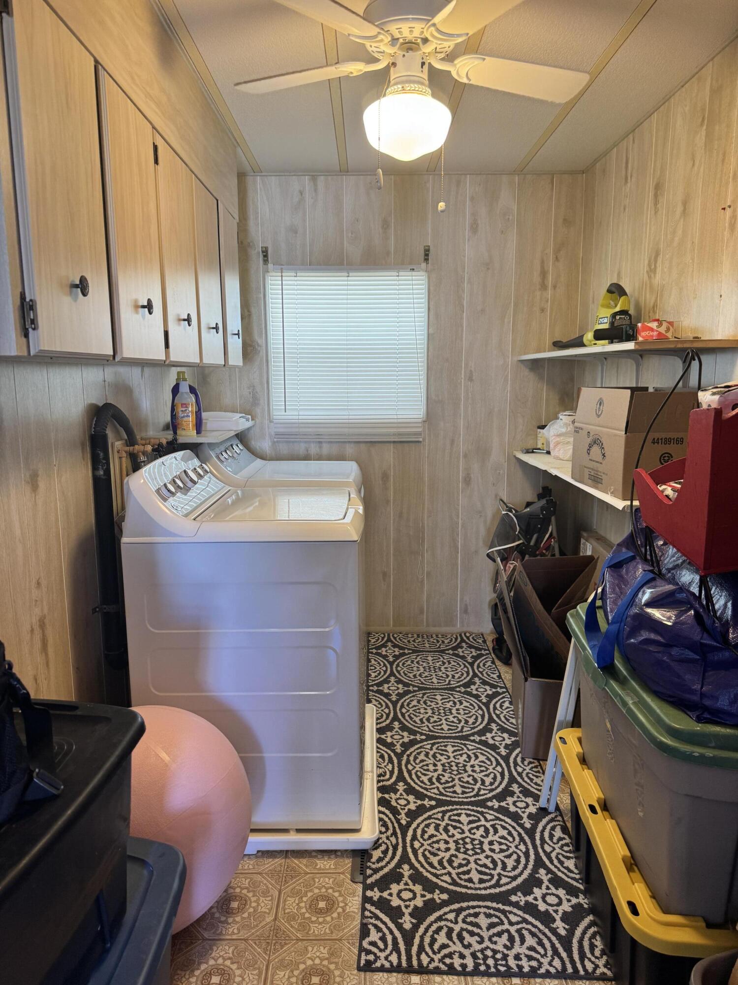 17 Verde Vista Fort Pierce, FL 34951 - Photo 34 of 35 a bathroom with a sink and a mirror