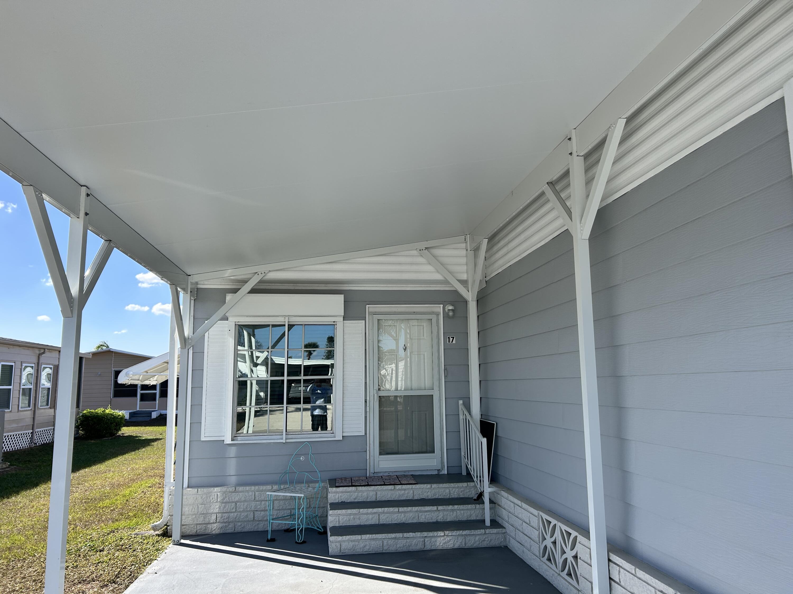 17 Verde Vista Fort Pierce, FL 34951 - Photo 4 of 35 a view of a porch door