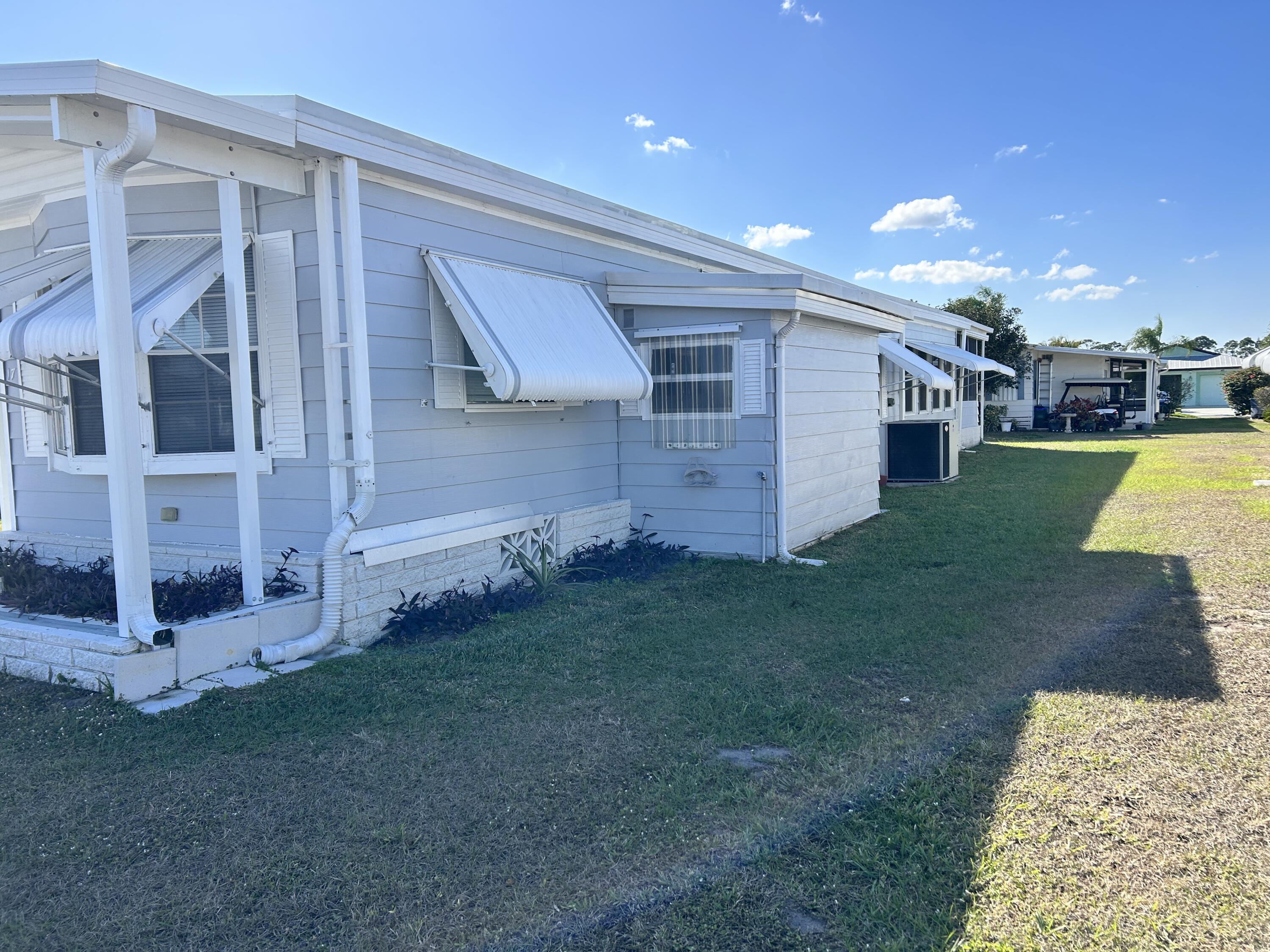 17 Verde Vista Fort Pierce, FL 34951 - Photo 6 of 35 a view of a backyard with plants