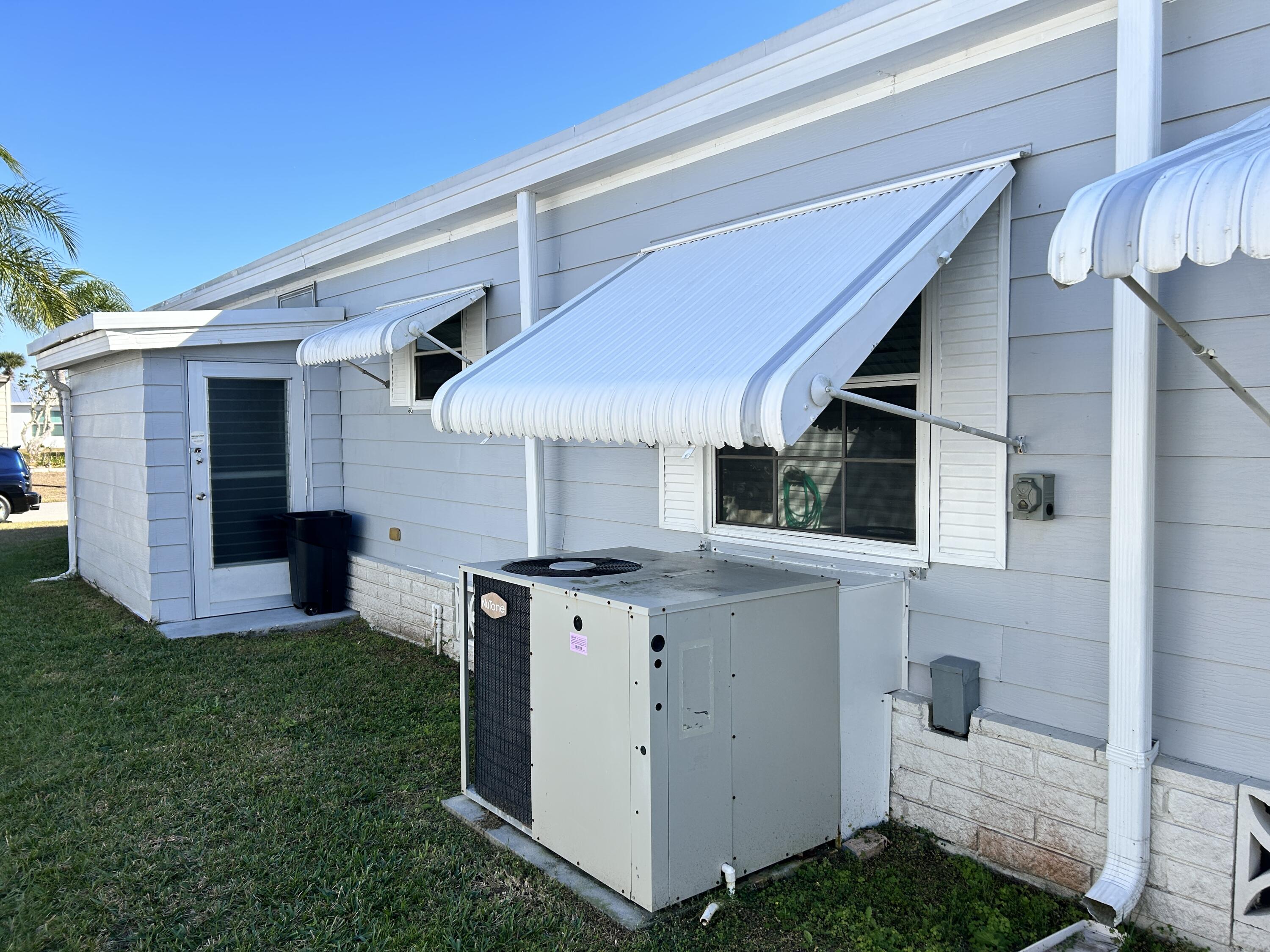 17 Verde Vista Fort Pierce, FL 34951 - Photo 7 of 35 a view of a house with a backyard