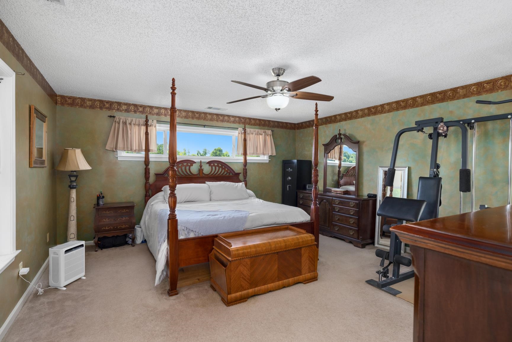 8539 Campground Road Drummonds, TN 38023 - Photo 17 of 38 a bedroom with a bed a desk and chair