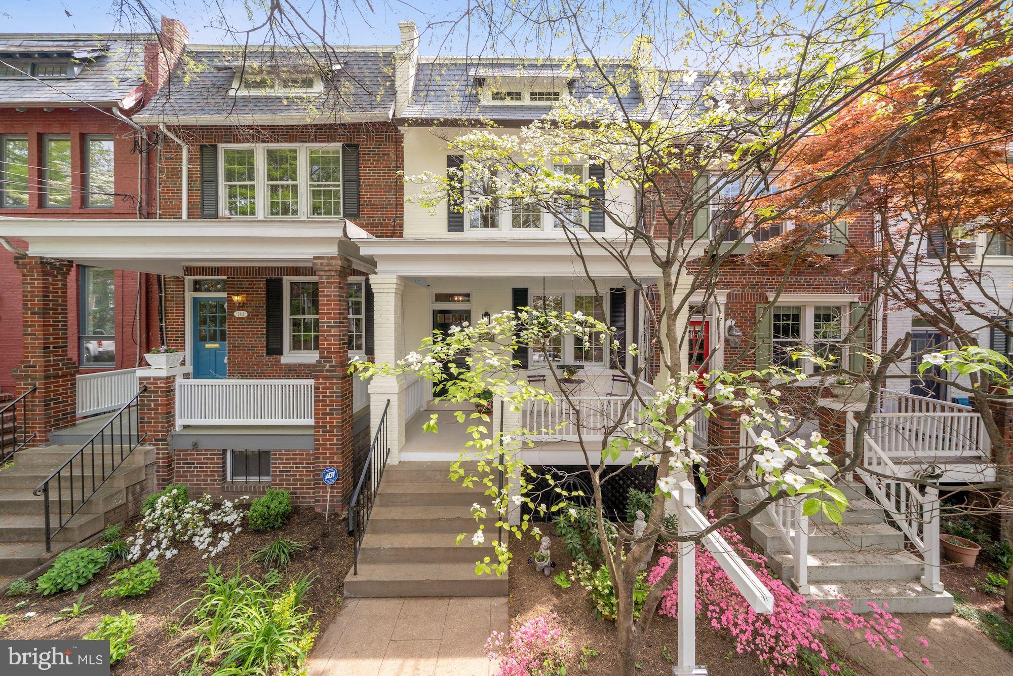 2409 Tunlaw Road Northwest Washington, DC 20007 - Photo 2 of 42 Mature flowers and trees