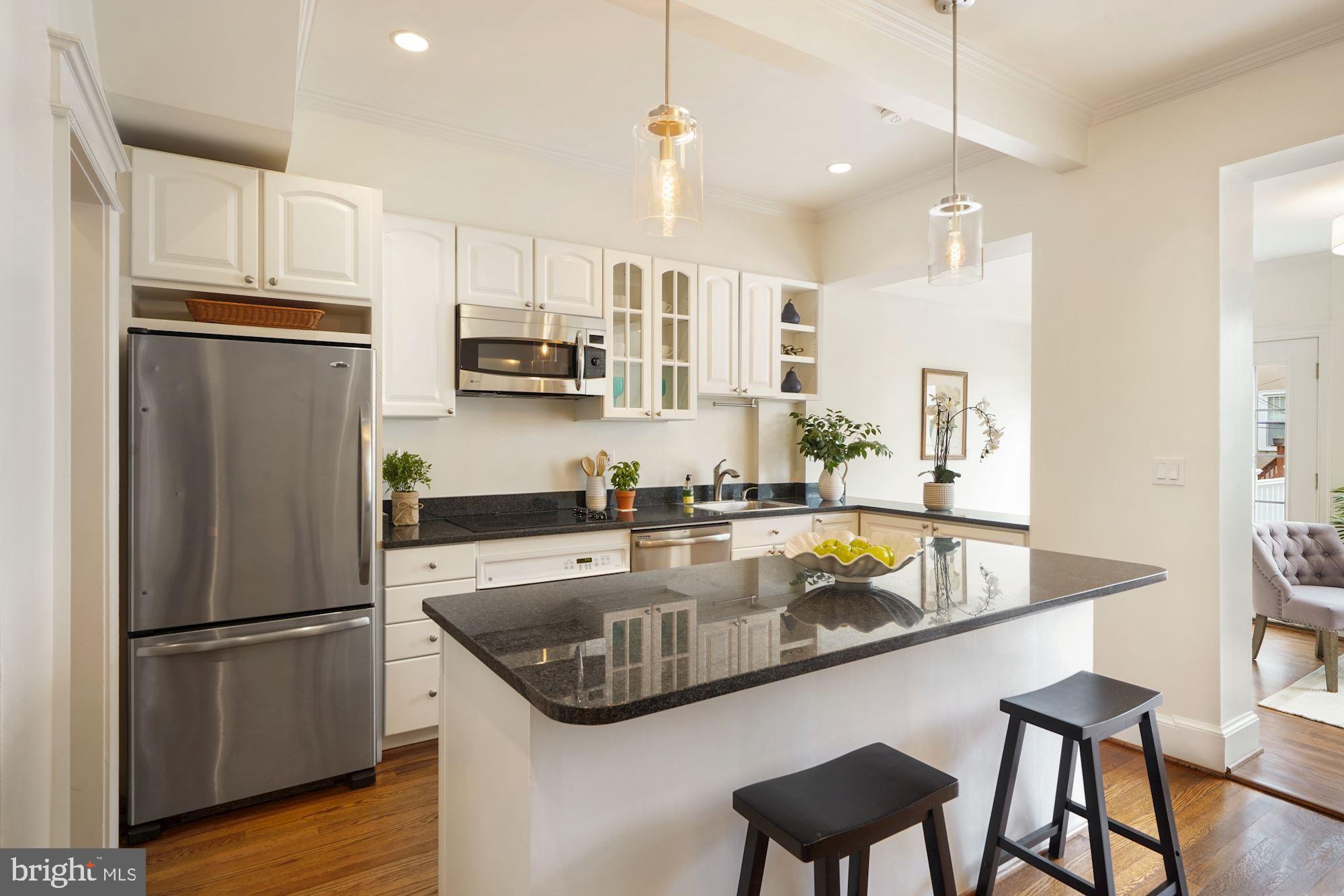 2409 Tunlaw Road Northwest Washington, DC 20007 - Photo 11 of 42 Lovely, elegant white kitchen