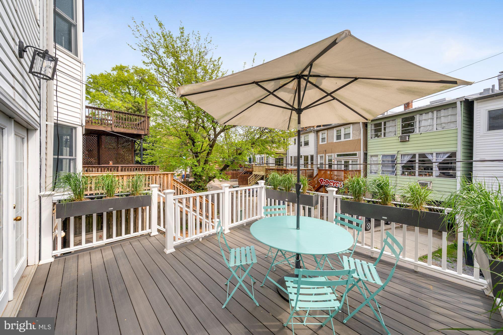 2409 Tunlaw Road Northwest Washington, DC 20007 - Photo 36 of 42 Deep, wide deck, perfect for outdoor dining