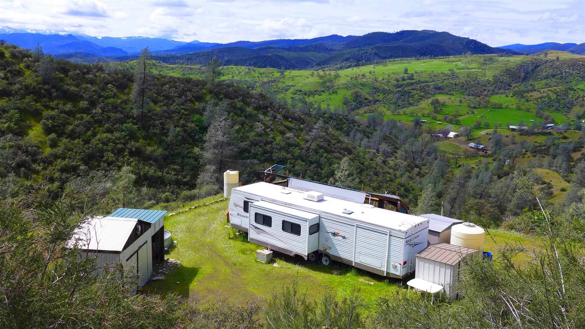 a aerial view of a house with a yard