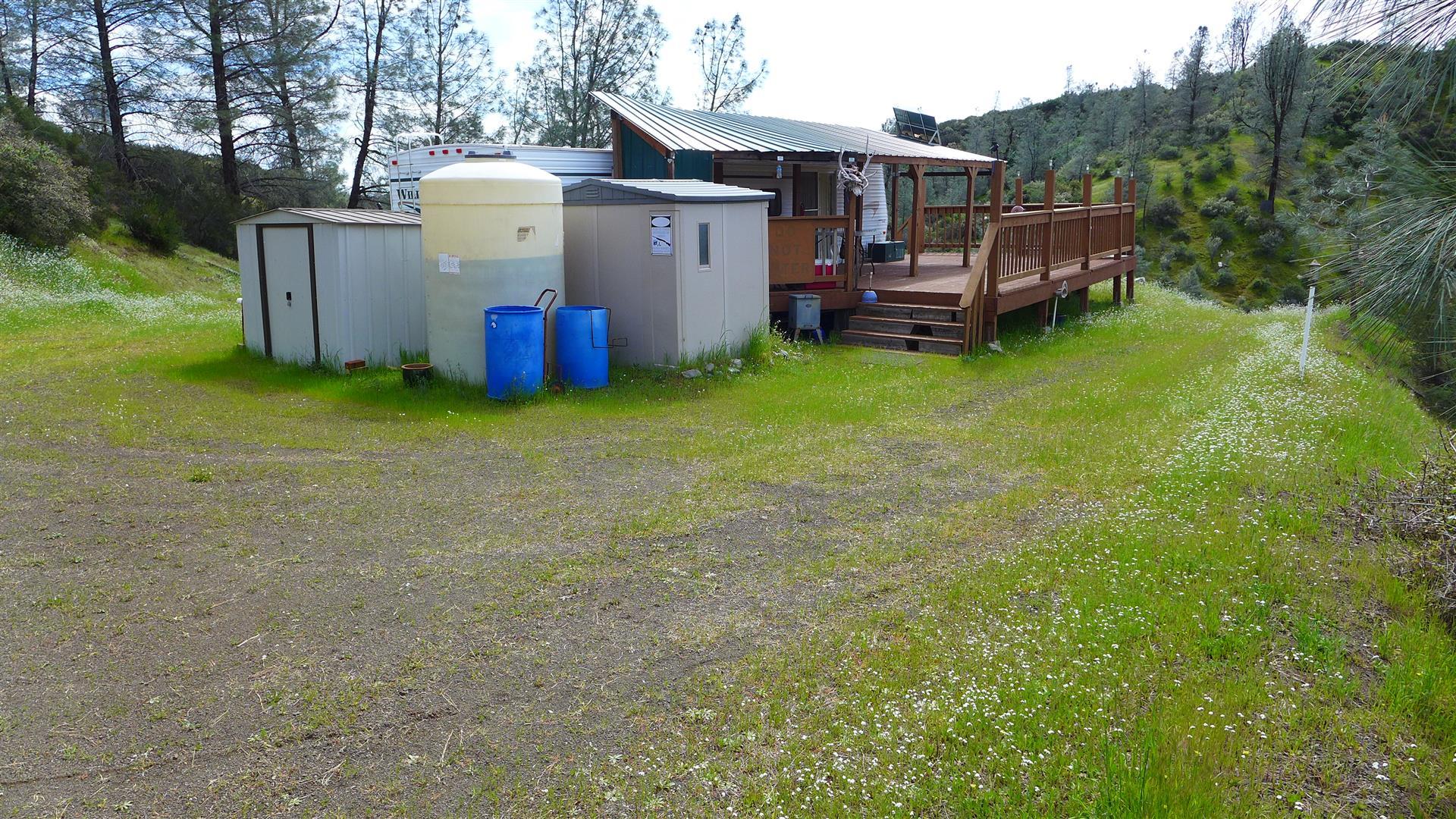 Lot 147 Wild Turkey Road Igo, CA 96047 - Photo 8 of 30 a view of a house with backyard and a patio