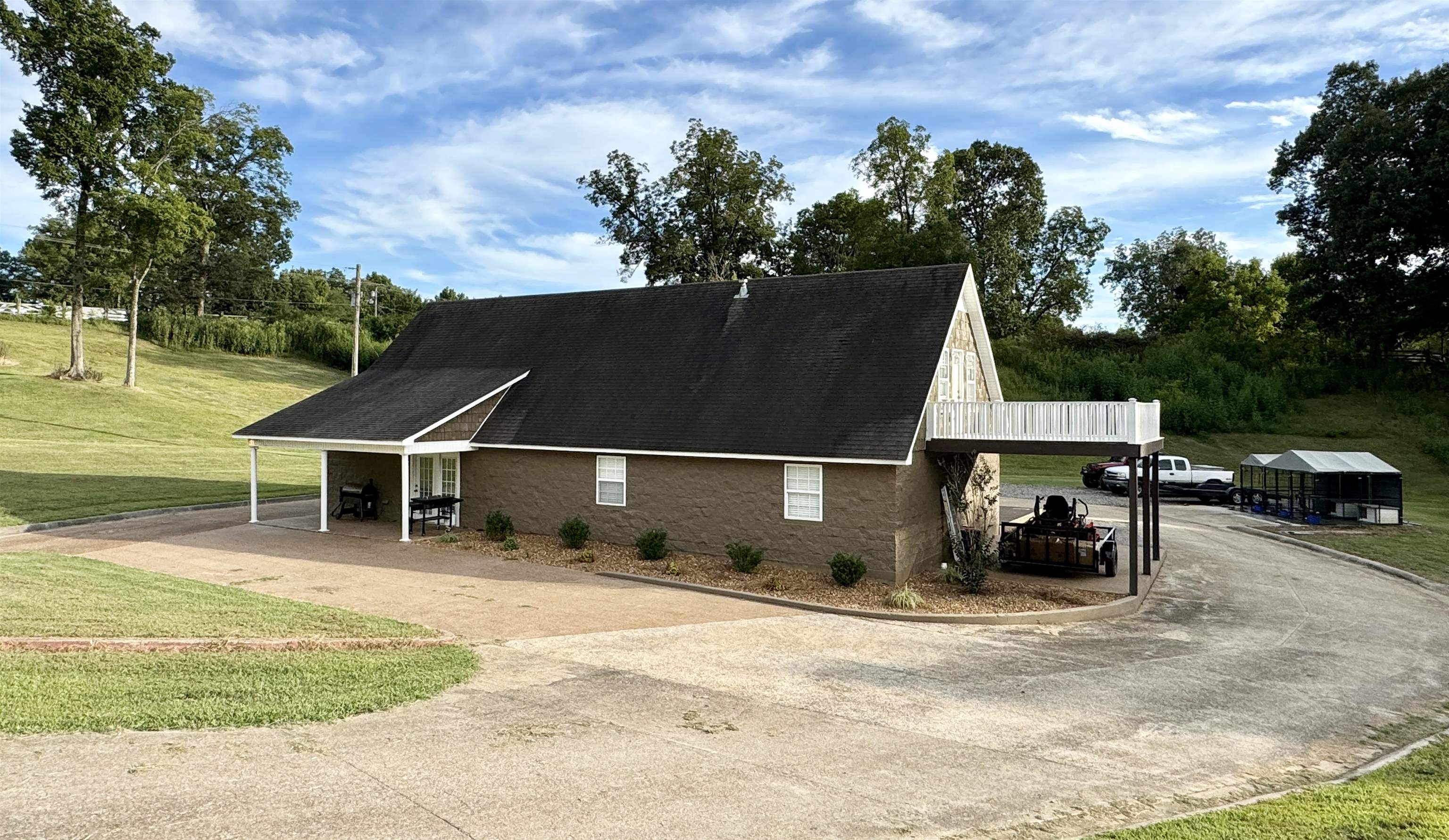 2455 Edith-Nankipoo Road Ripley, TN 38063 - Photo 8 of 29 a view of a house with a entertaining space
