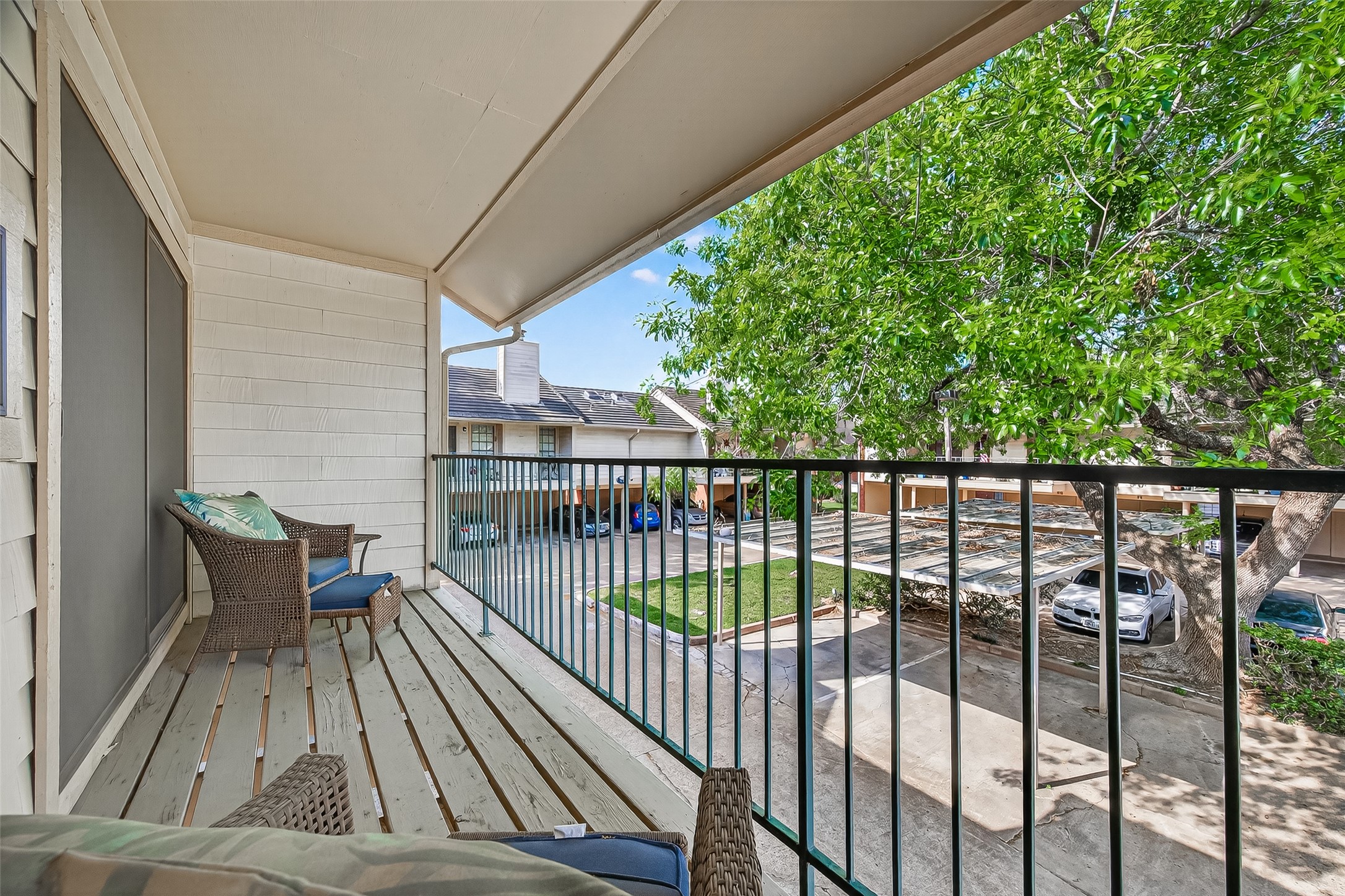 2211 South Kirkwood Road, Unit 42 Houston, TX 77077 - Photo 31 of 34 a view of balcony with wooden floor