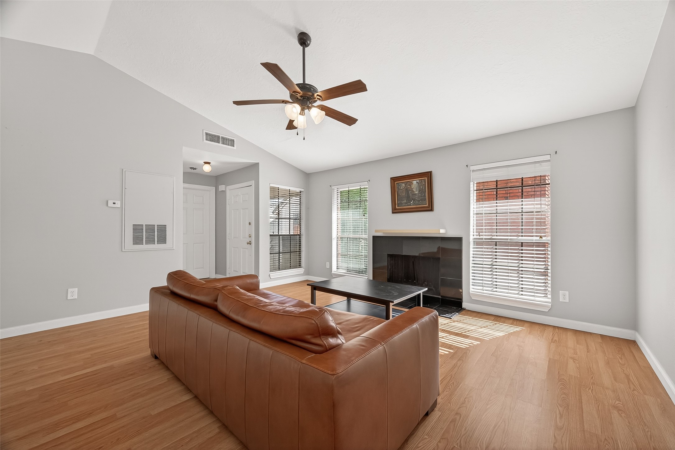 2211 South Kirkwood Road, Unit 42 Houston, TX 77077 - Photo 6 of 34 a living room with furniture fireplace and window