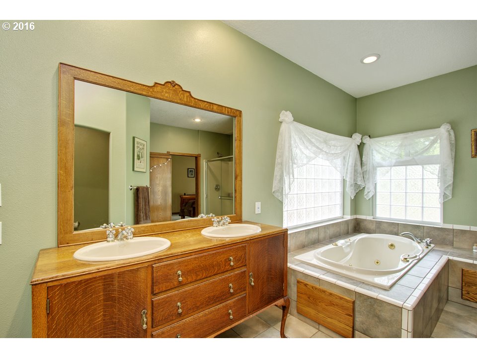 2686 Southeast Territorial Road Canby, OR 97013 - Photo 12 of 32 a bathroom with a sink double vanity and a mirror