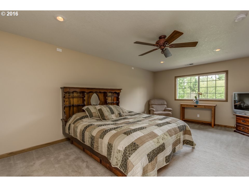 2686 Southeast Territorial Road Canby, OR 97013 - Photo 17 of 32 a bedroom with a bed and window