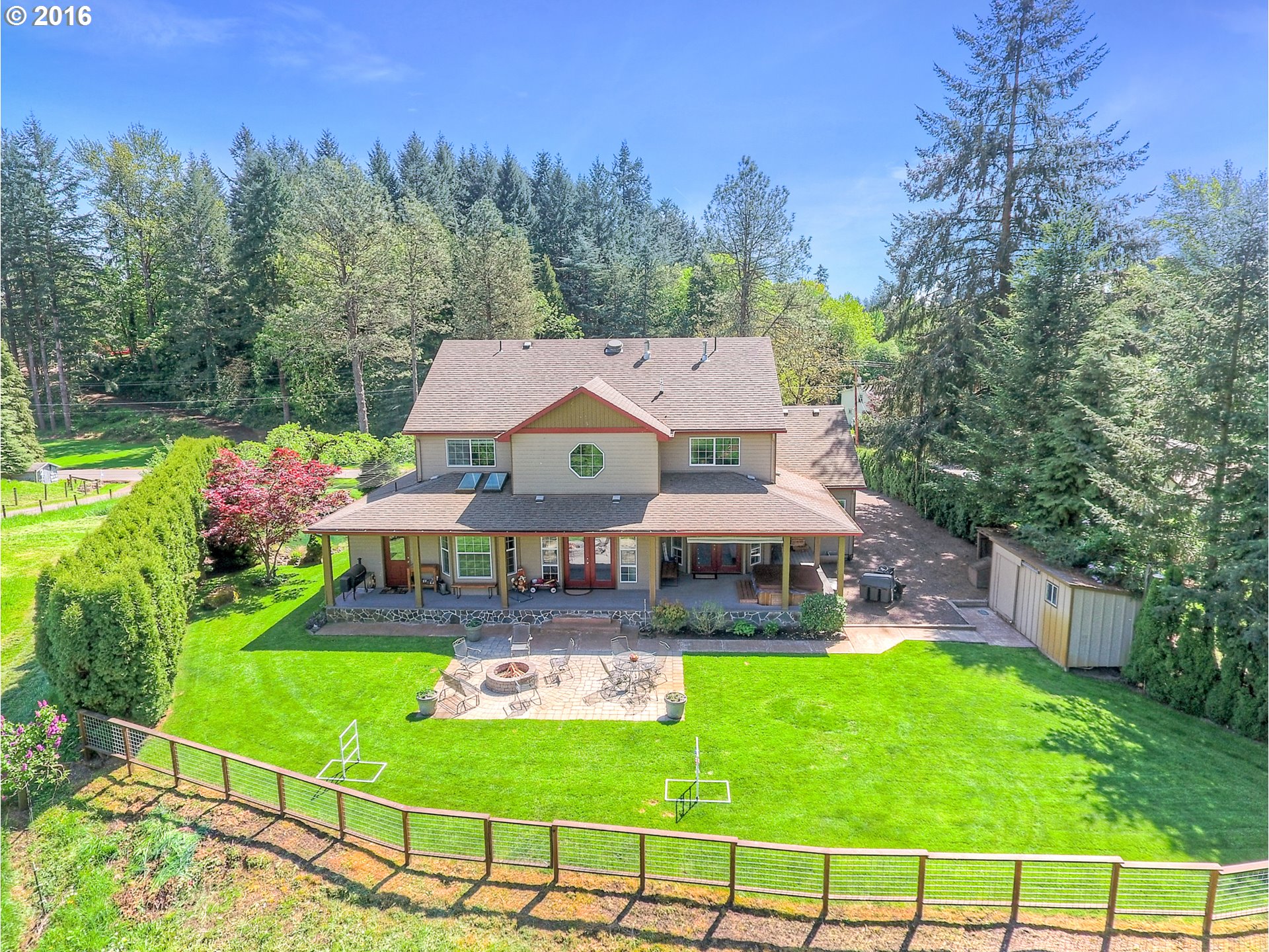 2686 Southeast Territorial Road Canby, OR 97013 - Photo 29 of 32 an aerial view of a house with swimming pool garden and patio