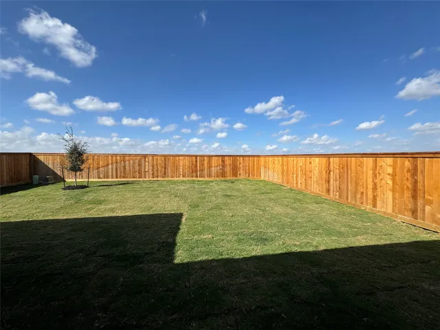 a view of an outdoor space and a yard