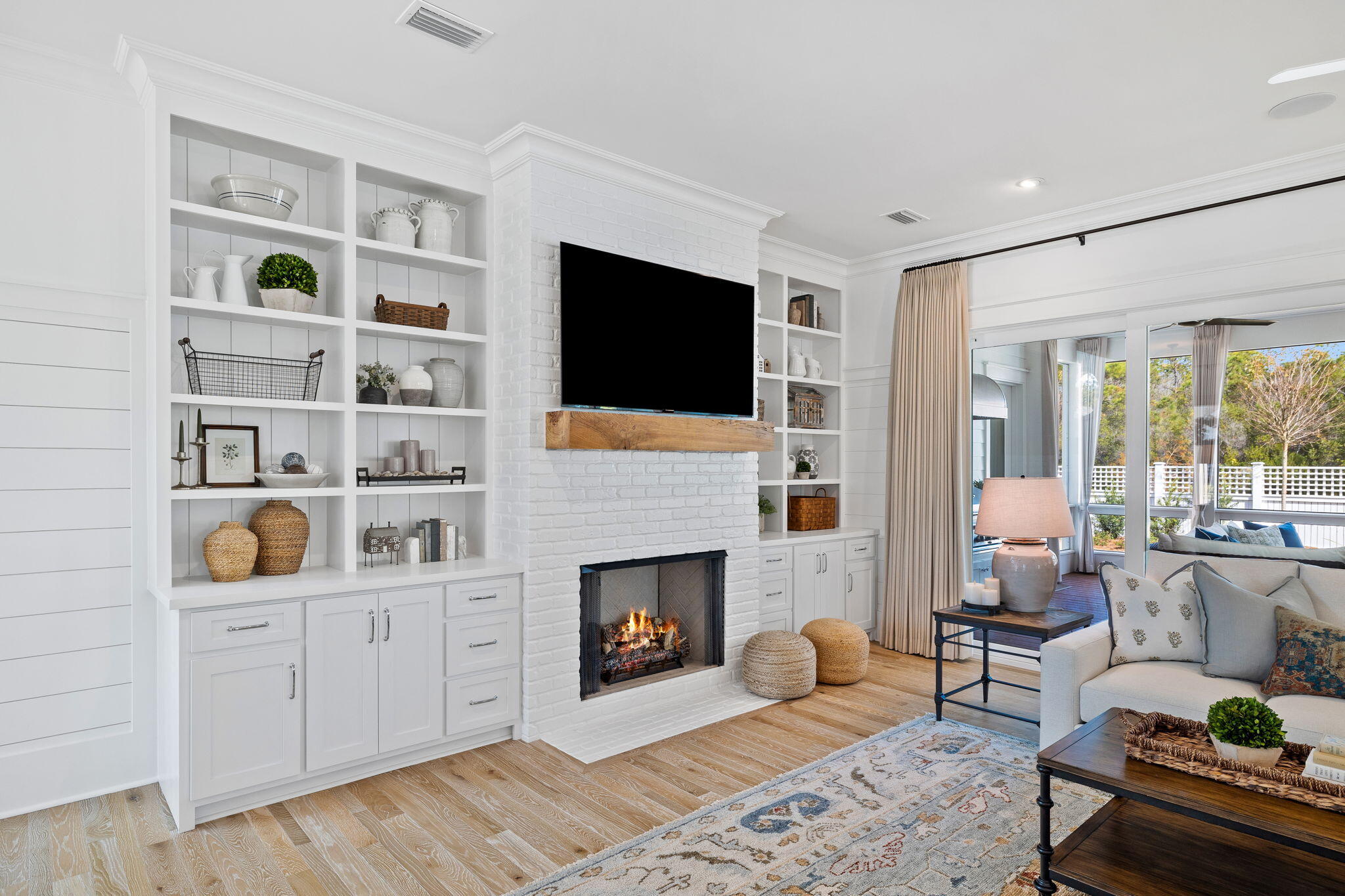 201 Needle Cast Ln Inlet Beach Inlet Beach, FL 32461 - Photo 30 of 92 a living room with furniture and a fireplace