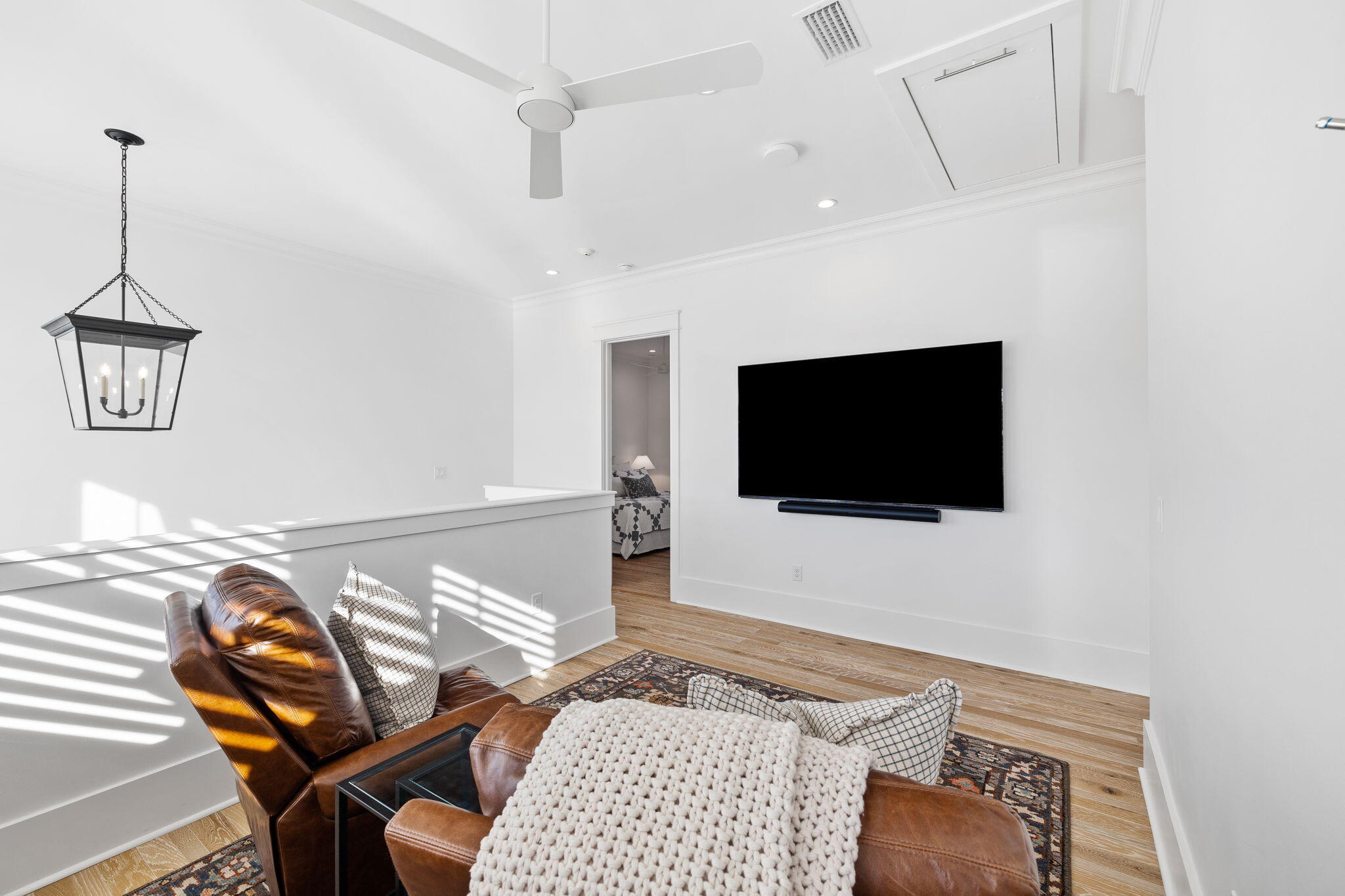 201 Needle Cast Ln Inlet Beach Inlet Beach, FL 32461 - Photo 60 of 92 a living room with furniture and a flat screen tv