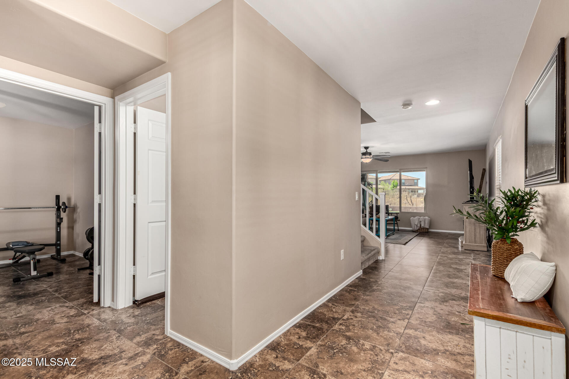 9528 Desert Fauna Loop Tucson, AZ 85747 - Photo 6 of 46 a view of entryway with livingroom and furniture