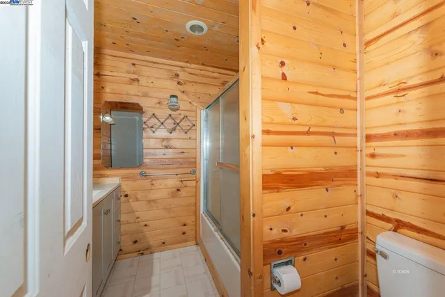 a outdoor space with patio furniture and a fireplace