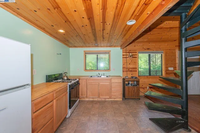 a room with furniture and a large window